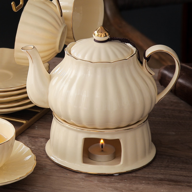 https://www.chicteapot.com/wp-content/uploads/2023/07/British-Handle-Ceramic-Glass-Teapot-With-Candle-Heating-Base-Set-European-Porcelain-Coffee-Pot-Afternoon-Tea.jpg